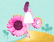 Woman in white dress with her back to us walking down a yellow brick road with pink flowers