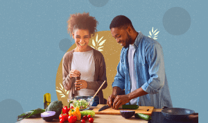 a black couple cooking together