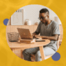 a feautred image for the blog 7 Best Side Hustles For Introverts (Low-Stress Ways To Make $1K Per Month) with a black man on a circle table, working in fron of a laptop. Background image is yellow with dollar signs and circles.