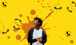 a feature sized image for the blog "The Embedded Messages In Tone Of Voice Communication" on a bright yellow background with dotted texture. An image of a man wearing eye glasses smiling, holding a mobile phone with telephones upside down beside him and an orange color splatter.