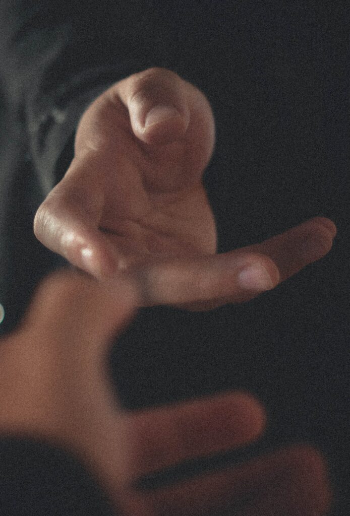 a photo of a hand trying to reach something